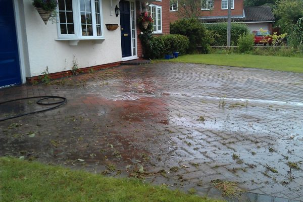 Driveway before our high pressure jet washing in Wigan
